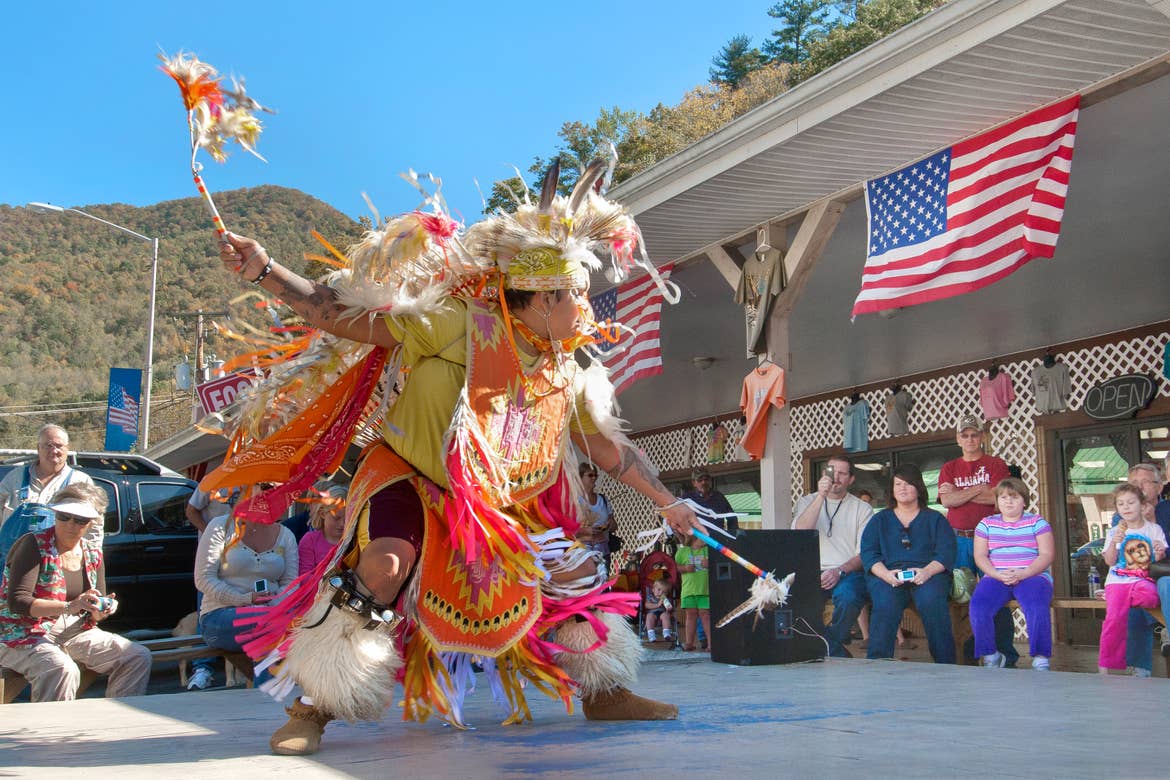 An outdoor performance from a member of the Cherokee Indian Reservation.