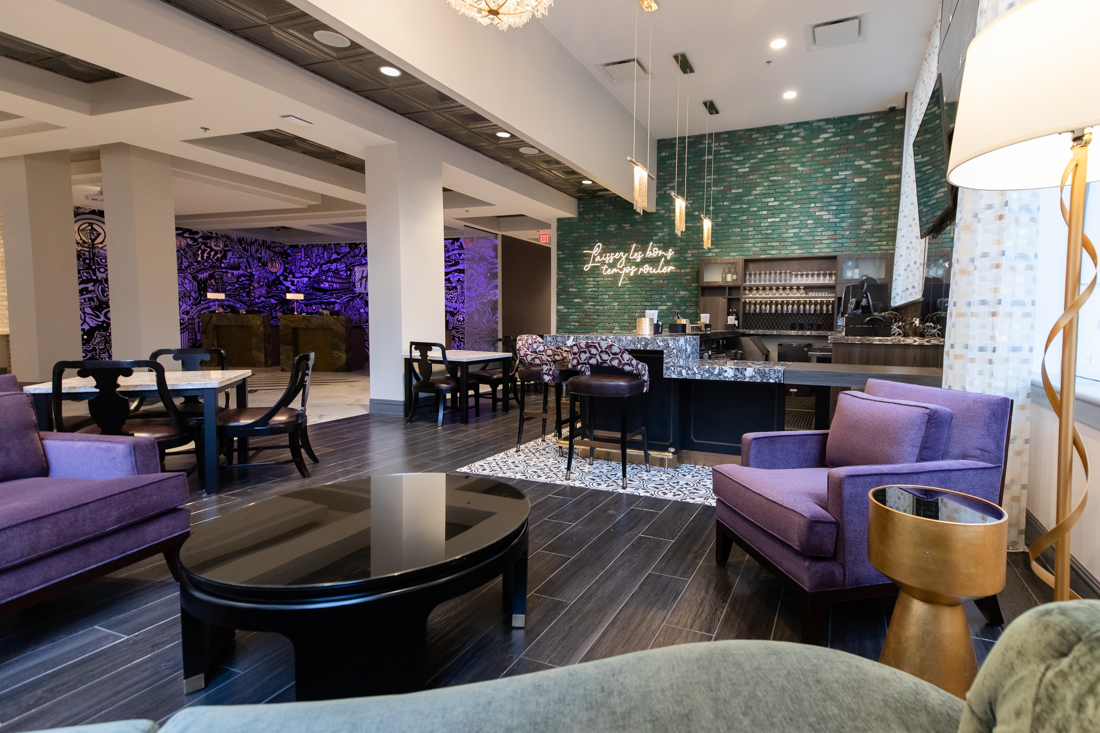 Maritime Bar & Lounge and seating area with purple chairs near the front near at New Orleans Resort in Louisiana.