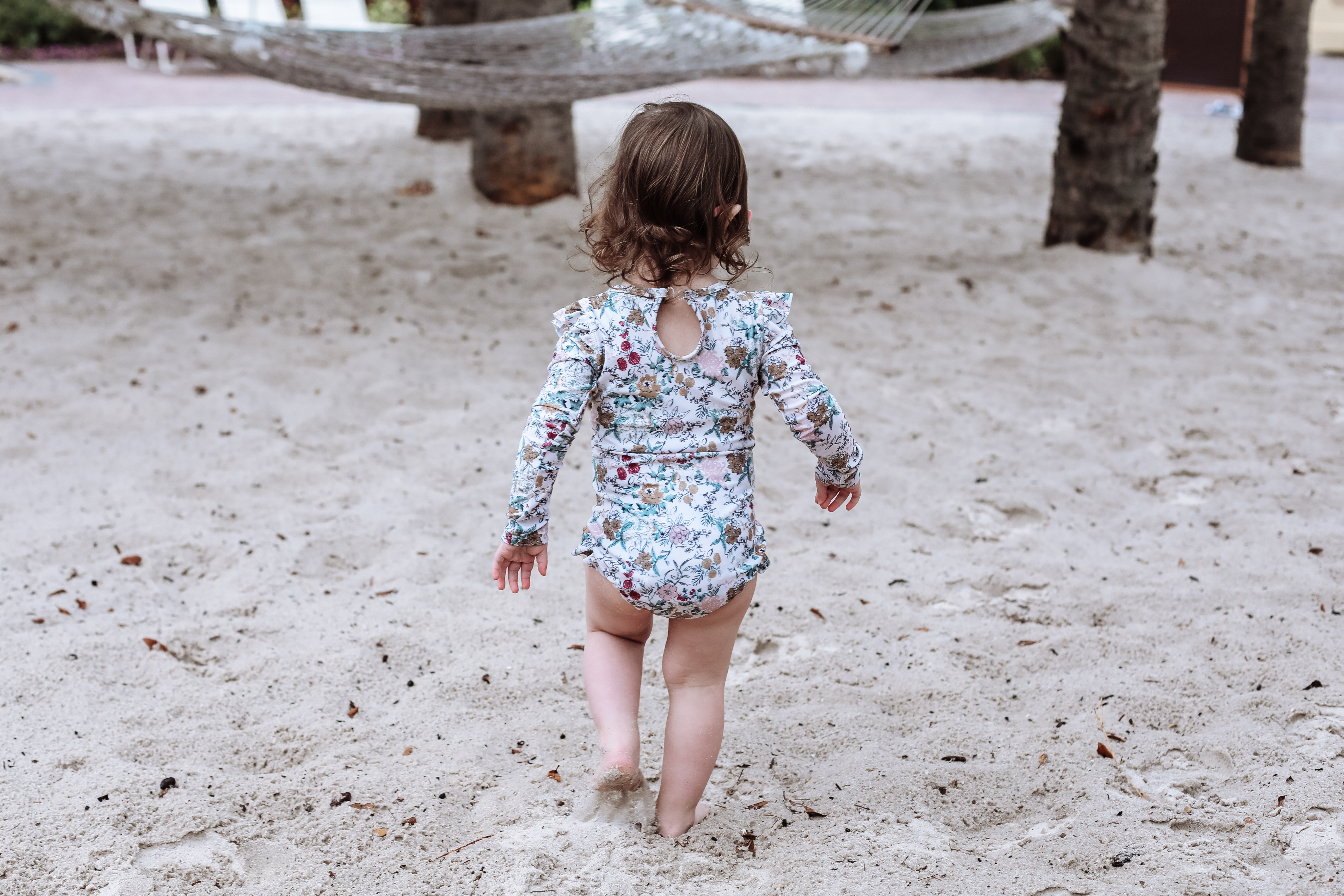 Mia's daughter running to hammock