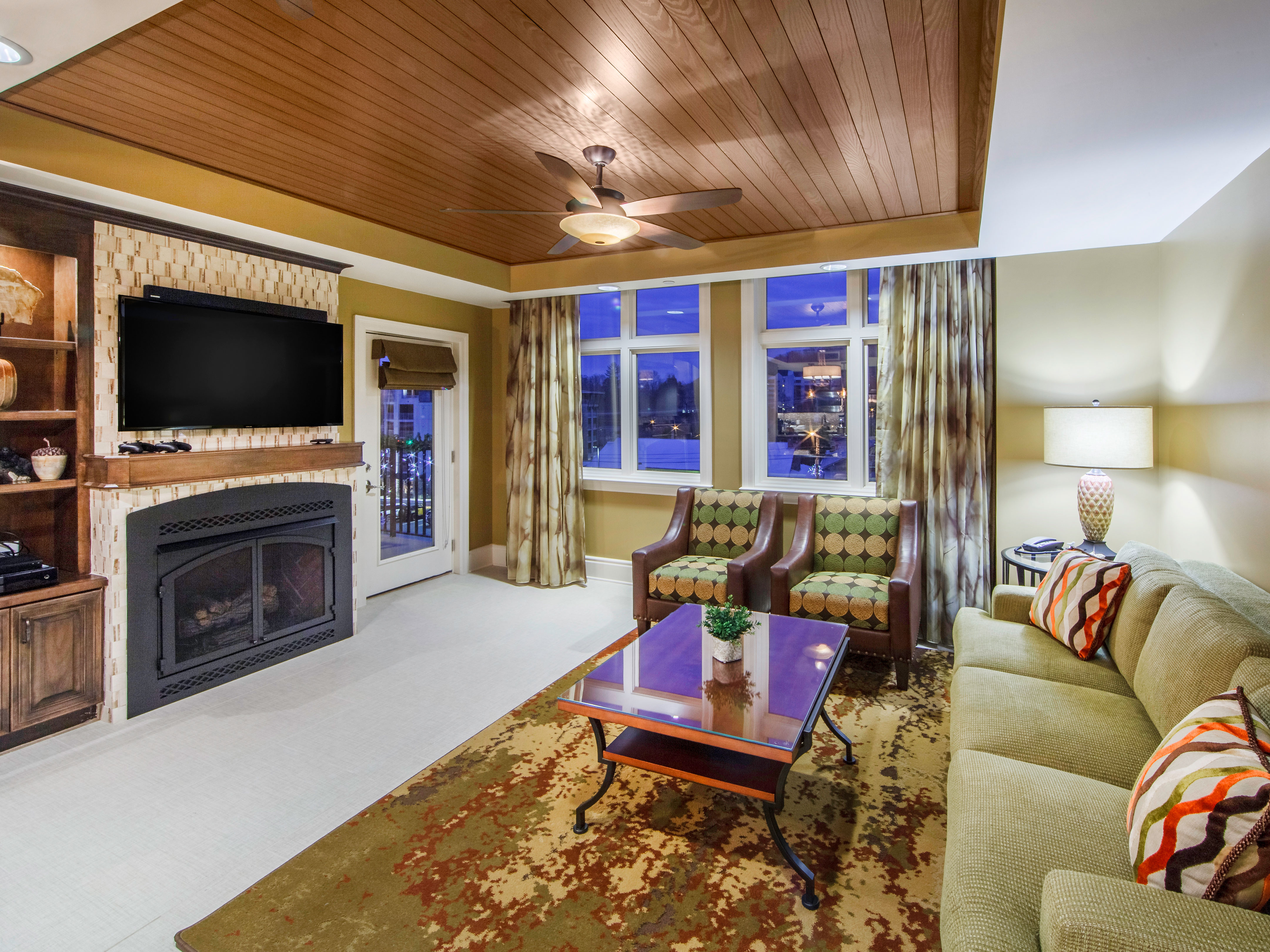 Living room with couch and two chairs at Smoky Mountain Resort in Gatlinburg, Tennessee.