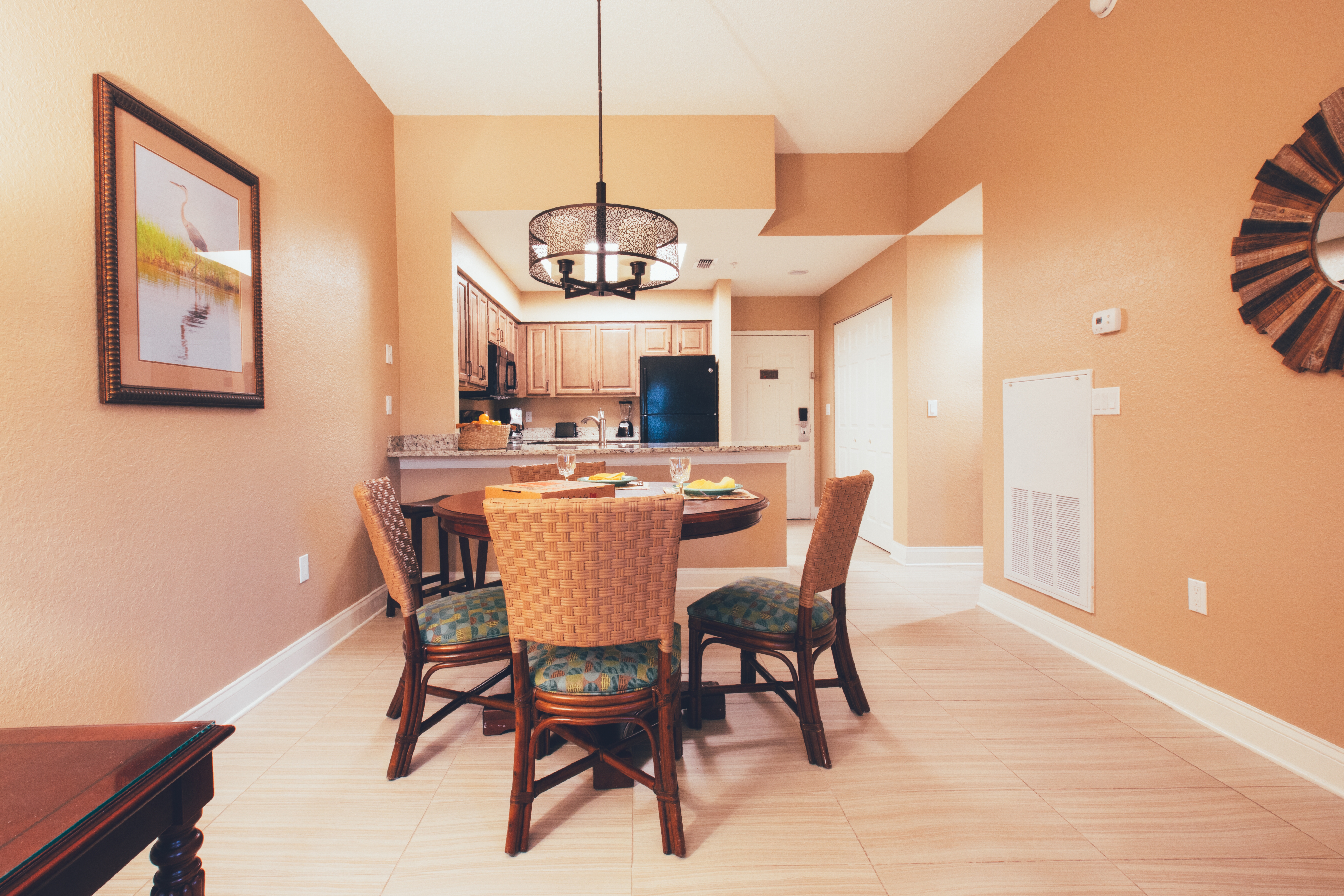 Dining table with four chairs in a one bedroom villa in North Village at Orange Lake Resort near Orlando, Florida