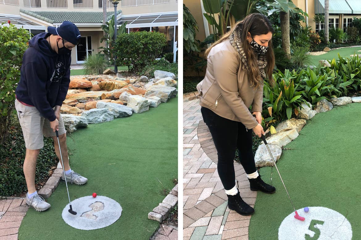 Left: Featured contributor and Checking In editor, Tori Ferrante (right), and her husband, Brooks (left) wear masks while playing mini golf at our Cape Canaveral Beach resort in Cape Canaveral, Florida.