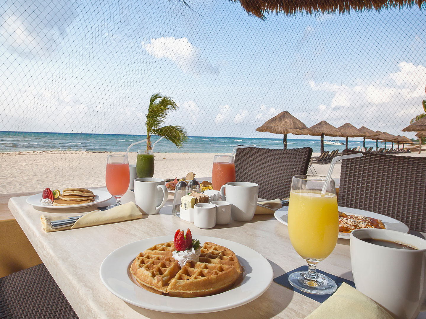 La Palapa del Sol, breakfast, on the beach, tabled waffles, pancakes, omelette, mimosa, coffee and juice at The Royal Haciendas, in Playa del Carmen, Mexico