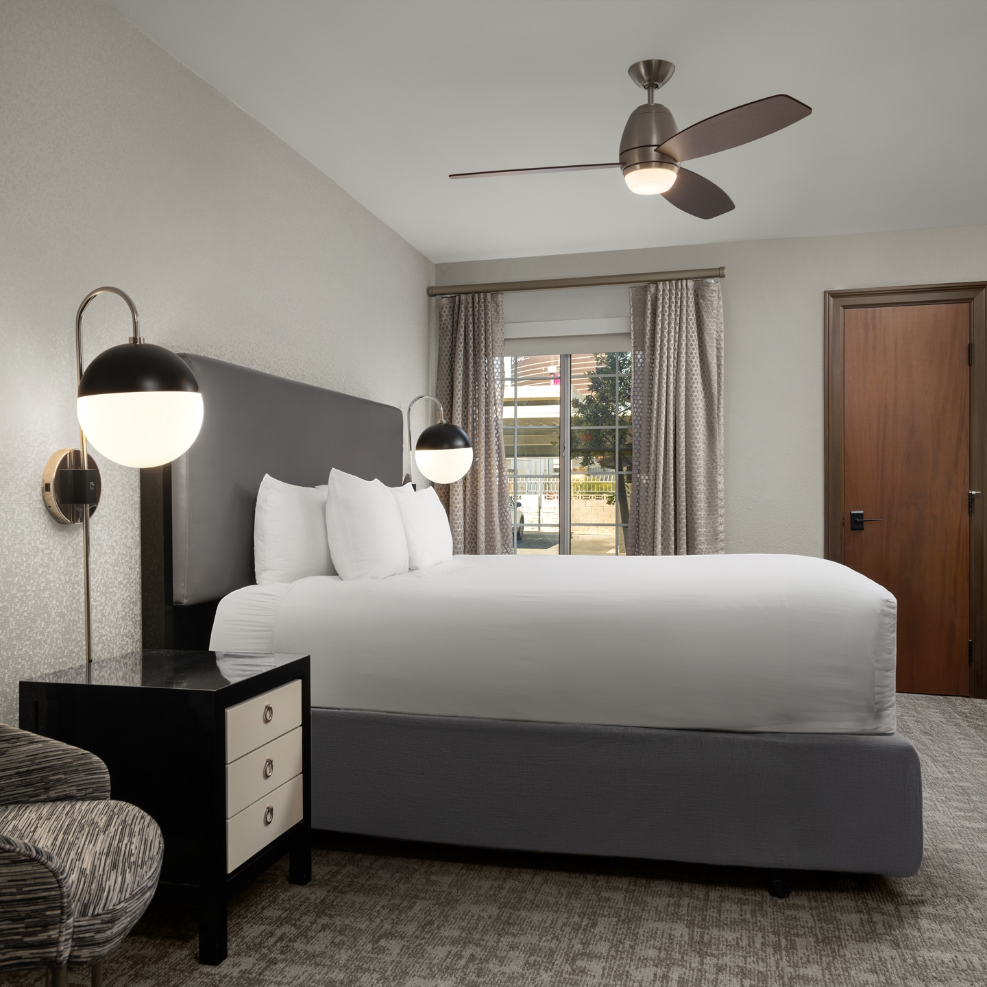 Bedroom with modern lighting and contemporary decor.
