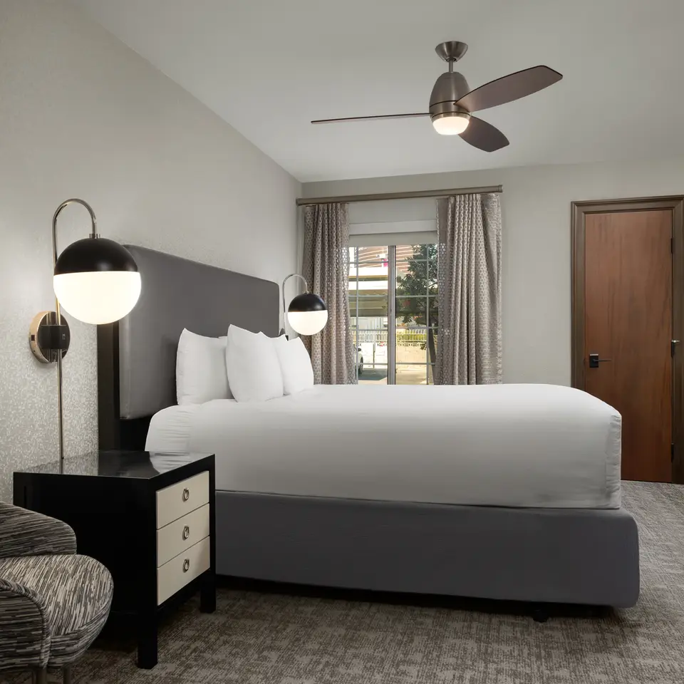 Bedroom with modern lighting and contemporary decor.