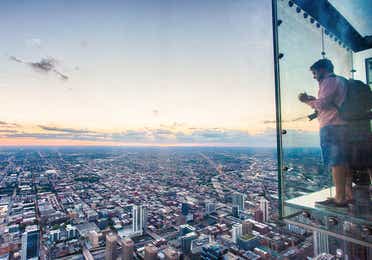Tourists viewing the skyline of Chicago on the Skydeck near Fox River Resort in Sheridan, Illinois.