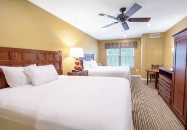 Two beds in a studio villa at Fox River Resort in Sheridan, Illinois.