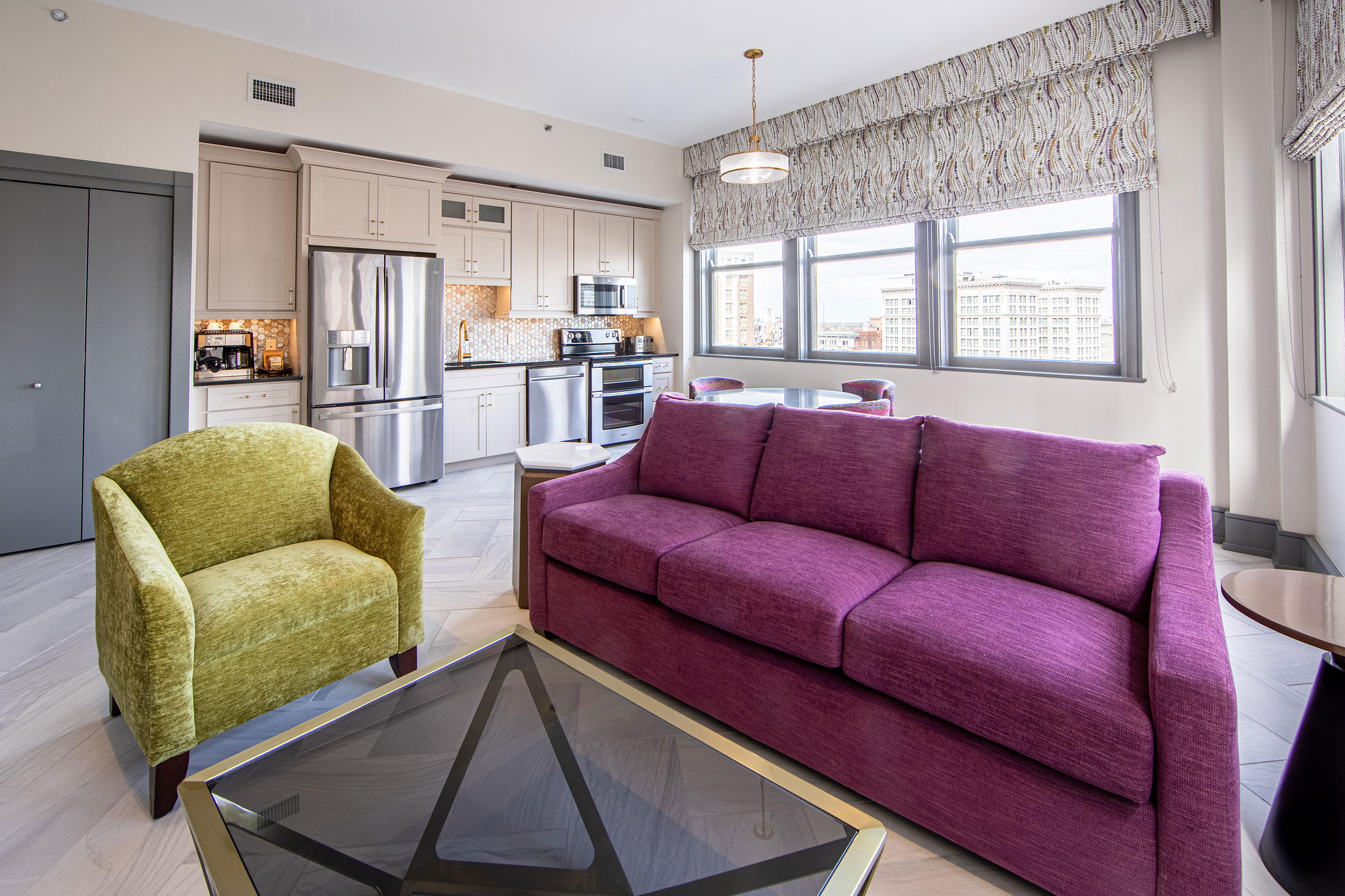 An interior shot of our Signature Collection villa with green and purple furnishings in our New Orleans resort located in Louisiana.