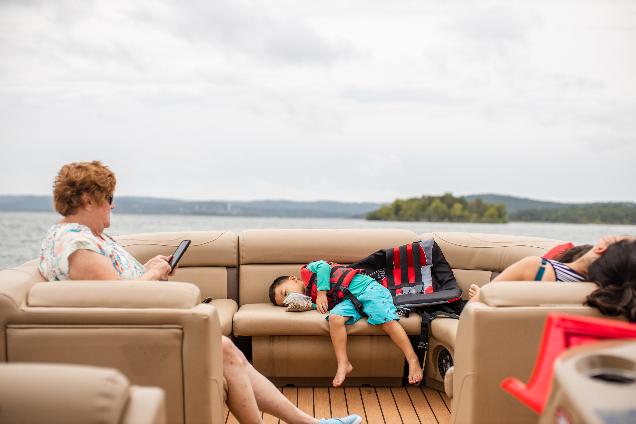 Asher sleeping on the boat