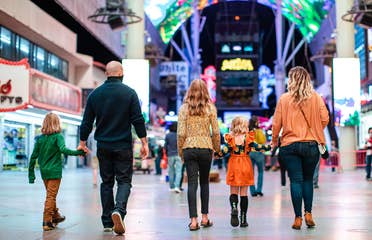 The Haby family walk down Fremont street near our Desert Club Resort located in Las Vegas, Nevada.