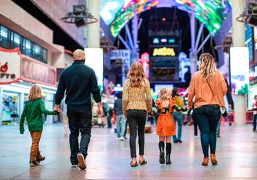 The Haby family walk down Fremont street near our Desert Club Resort located in Las Vegas, Nevada.