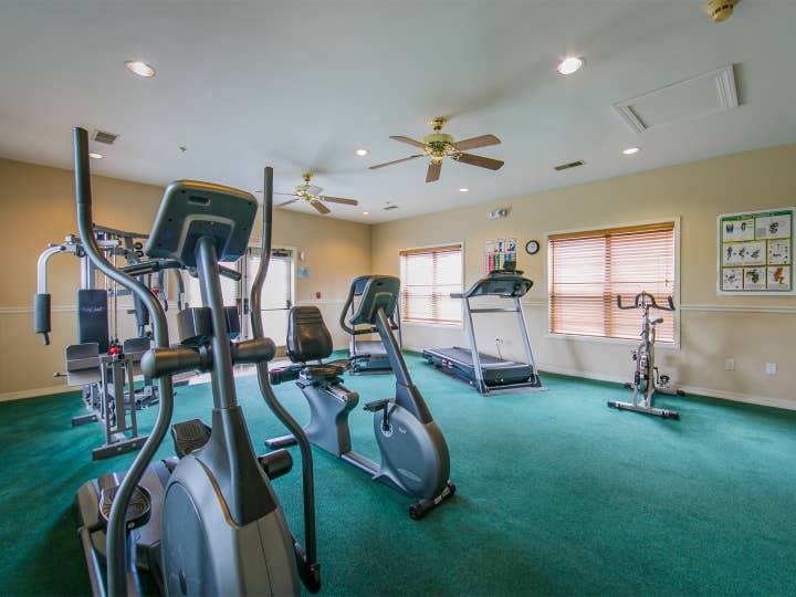 Fitness Center with ellipticals, stationary bikes and treadmills at Holiday Hills Resort in Branson, Missouri.
