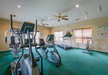 Fitness Center with ellipticals, stationary bikes and treadmills at Holiday Hills Resort in Branson, Missouri.