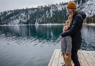 Mom and child looking at Lake Tahoe near Tahoe Ridge Resort in Stateline, Nevada.