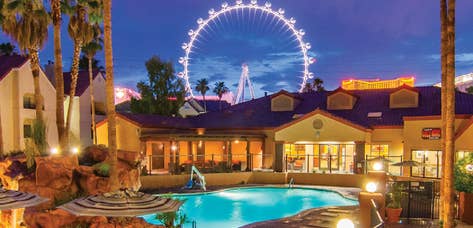 Outdoor pool with view of The LINQ® at Desert Club Resort in Las Vegas, Nevada.