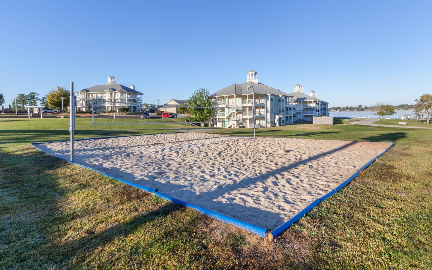 Outdoor sand volleyball at Piney Shores Resort in Conroe, Texas.