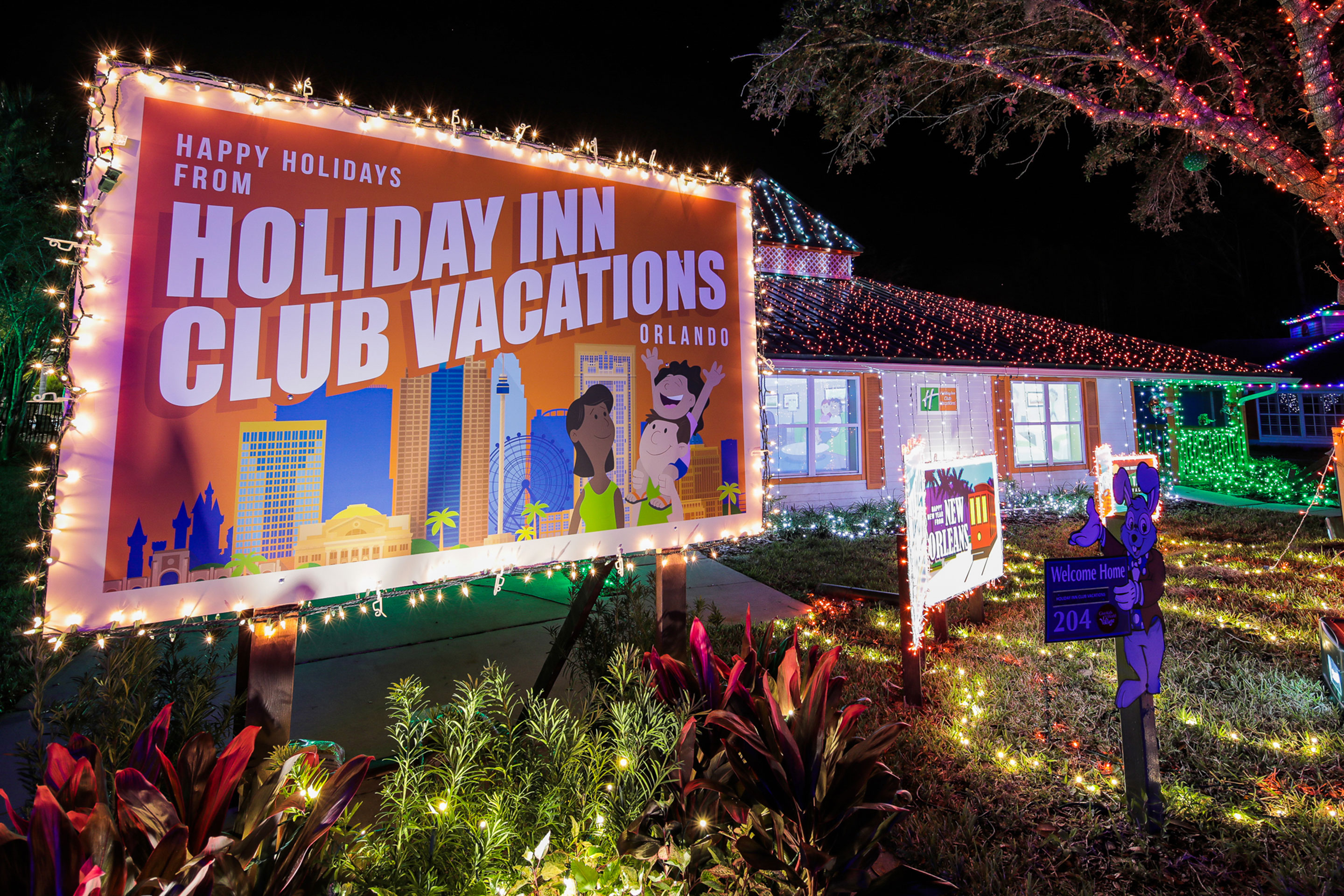 An exterior shot of our HICV villa decorated for the 'Night of a Million Lights' event complete with oversized travel postcards.