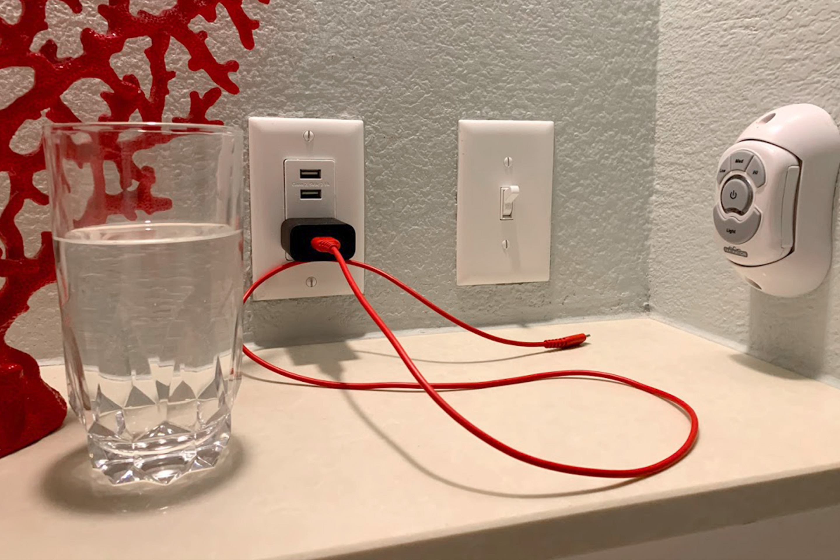 An outlet for USB and fan controller from the interior of our Signature Collection villa at Galveston Beach Resort.