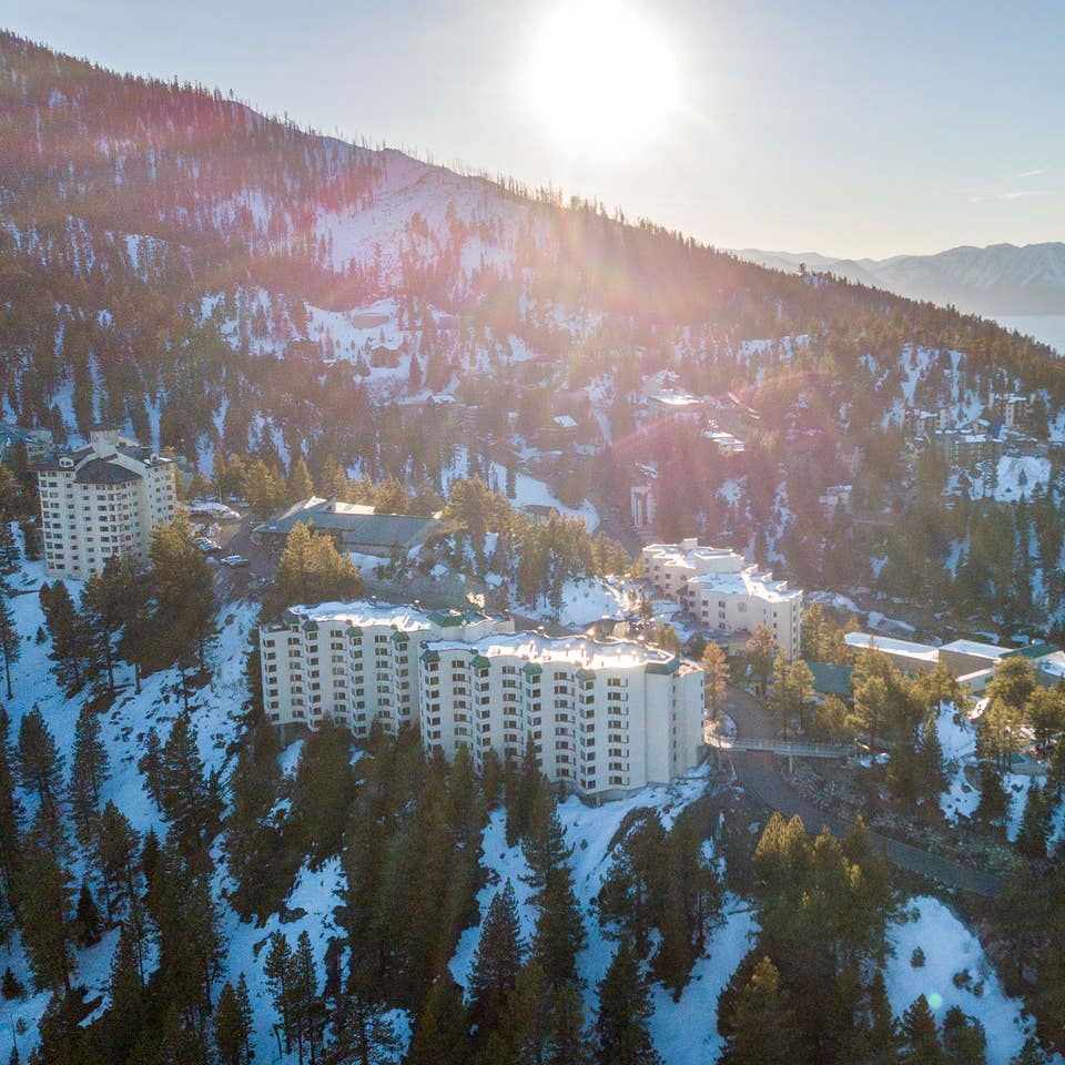 Exterior view of property on snowy hills at Tahoe Ridge Resort in Stateline, Nevada.