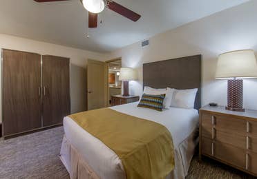 Guest bedroom with wardrobe in a two-bedroom villa at Scottsdale Resort