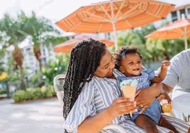 Family enjoying ice cream at Orange Lake Resort near Orlando, Florida.