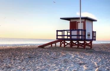 Cape Canaveral Beach with Lifeguard hut at sunset.