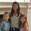 Chris Johnston and her two daughters, Kyndall and Kyler, smiling at the camera