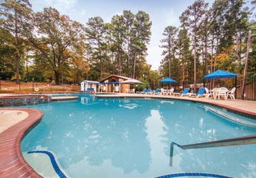 Outdoor pool at Holly Lake Resort in Texas.