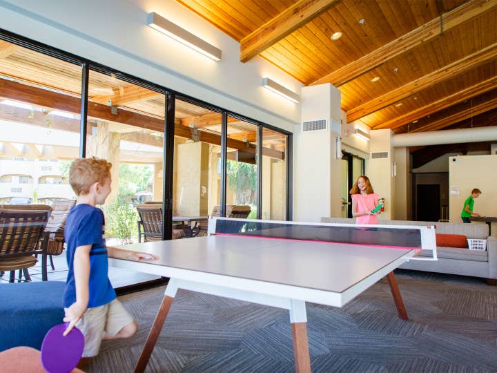 Children playing ping pong at Scottsdale Resort in Scottsdale, Arizona