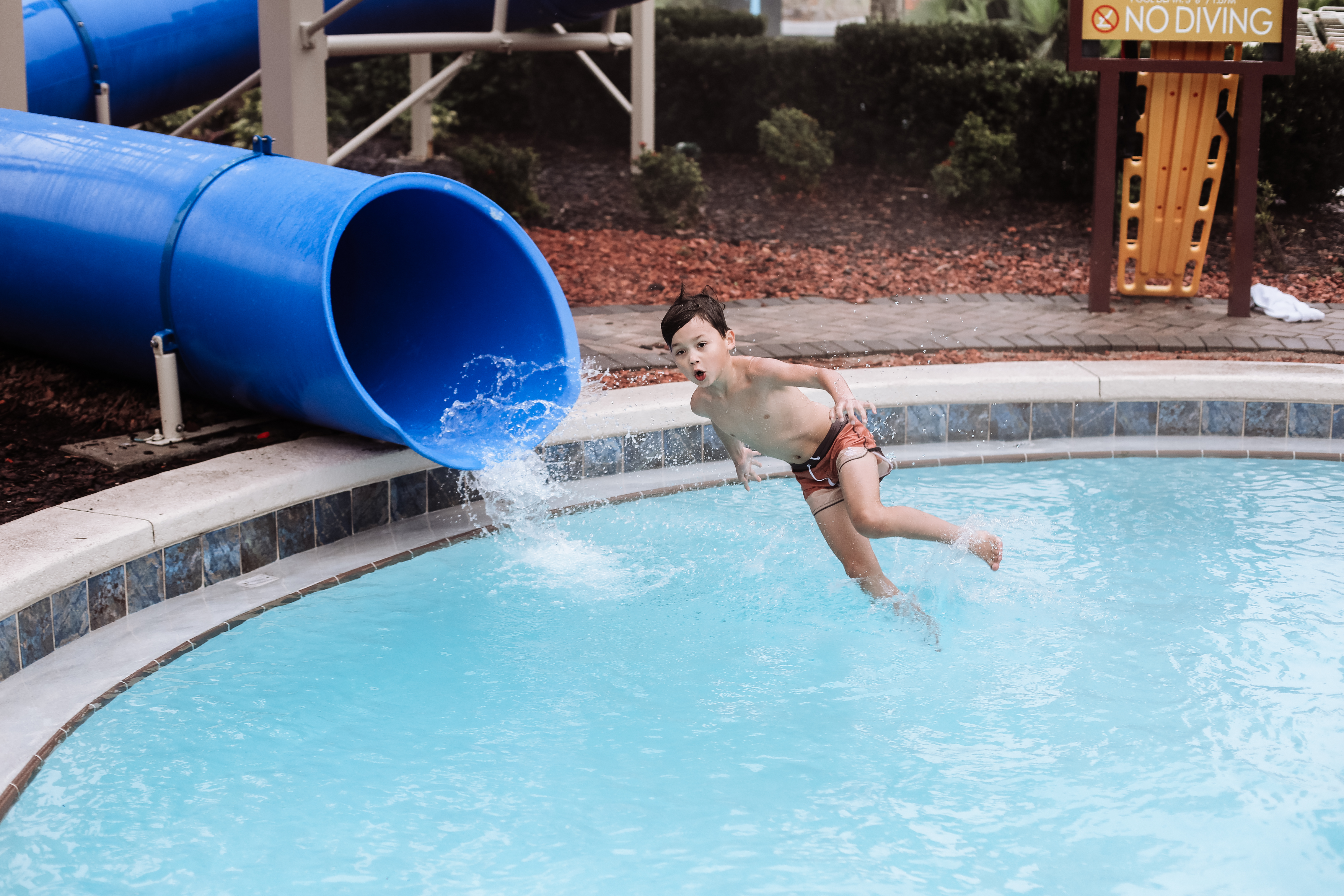 Mia's son on a waterslide