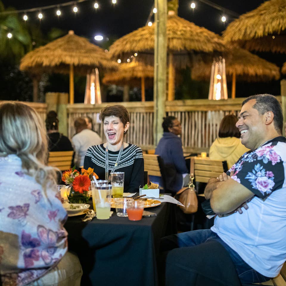 Members laughing together at a VIP Experience at Orange Lake Resort in Orlando, Florida.
