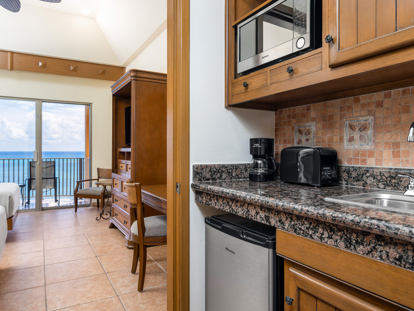 Kitchenette with ocean views for effortless beachfront stays.