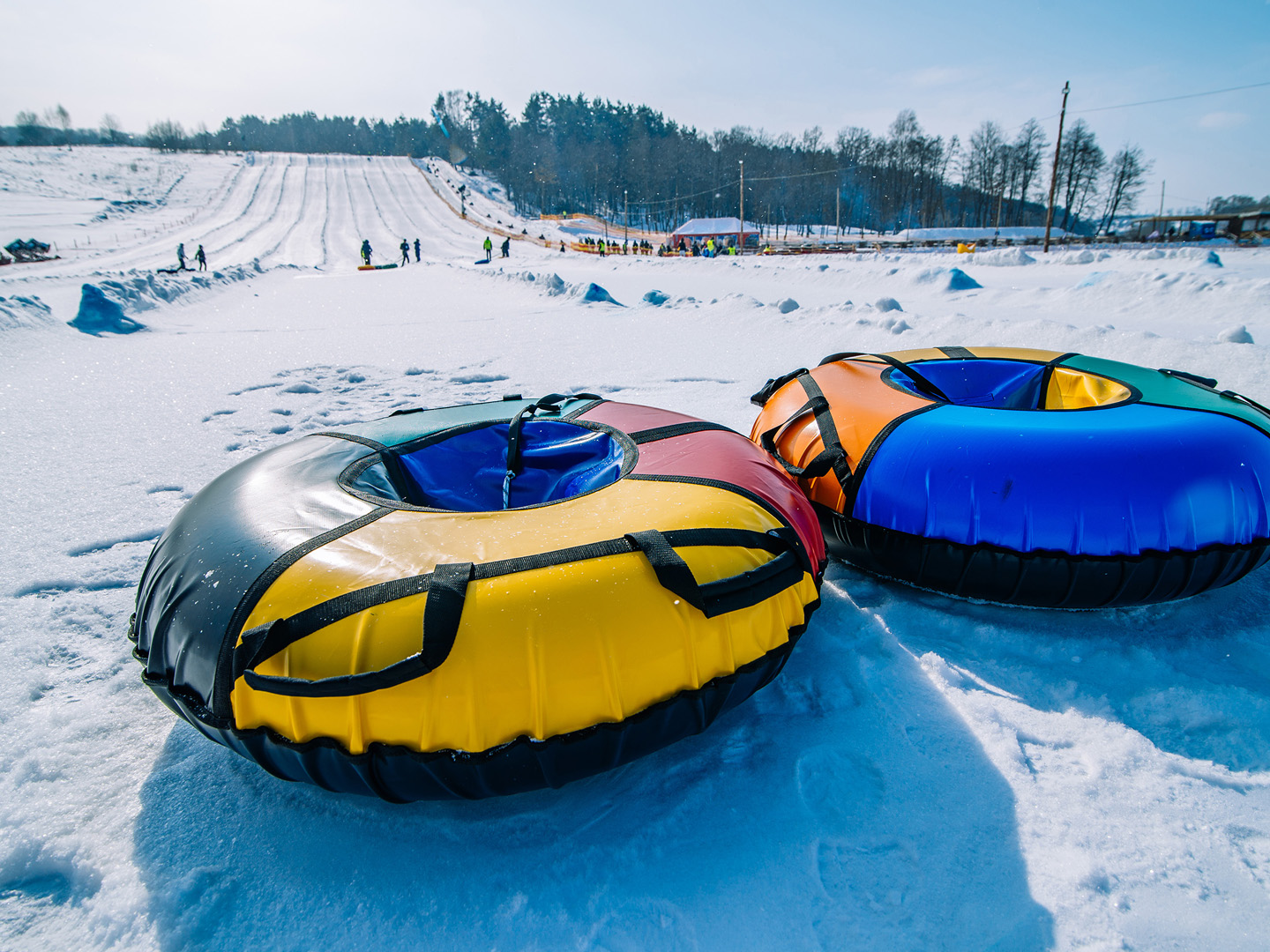 Two snow tubes on mountain