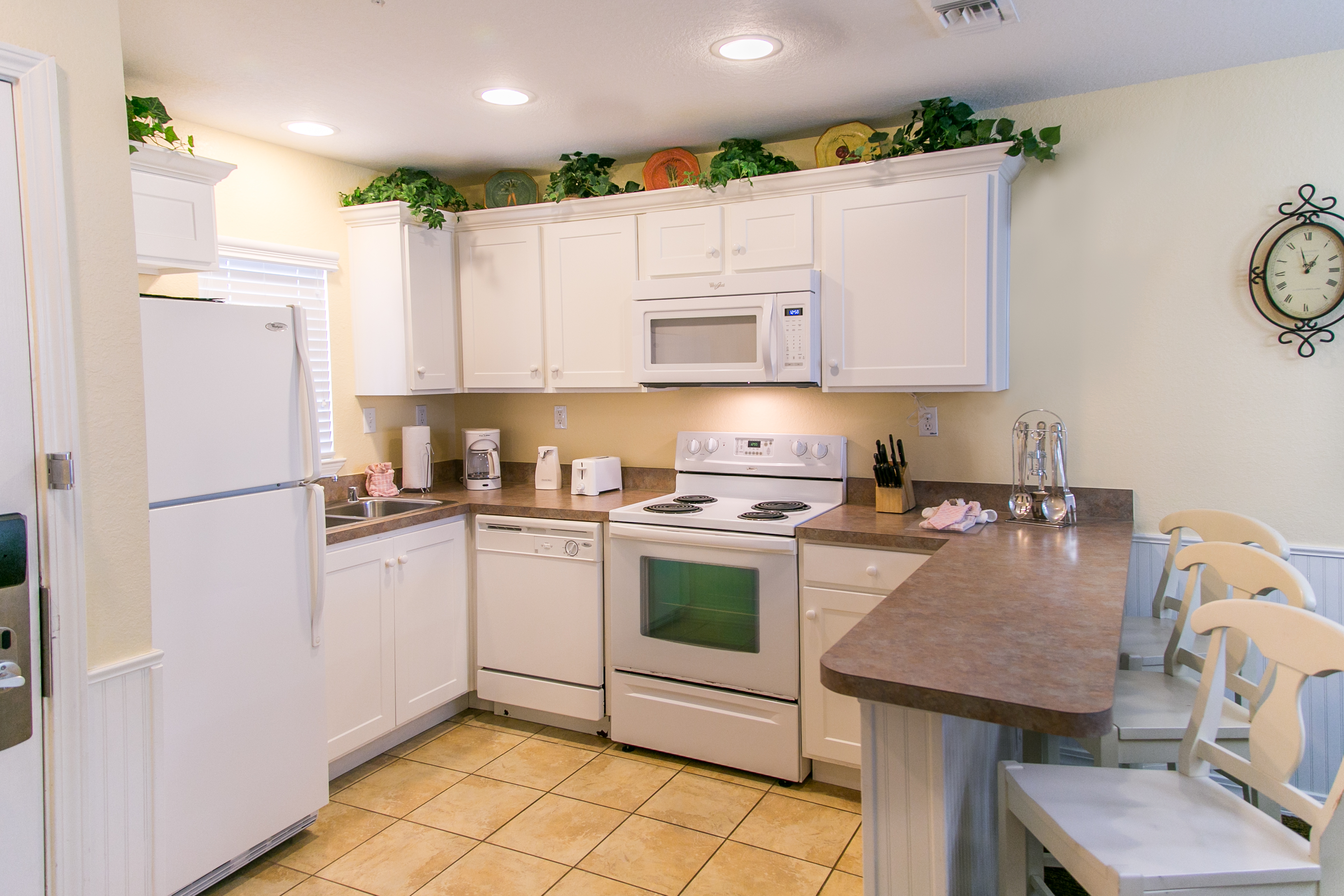 Kitchen in a villa at Orlando Breeze Resort.