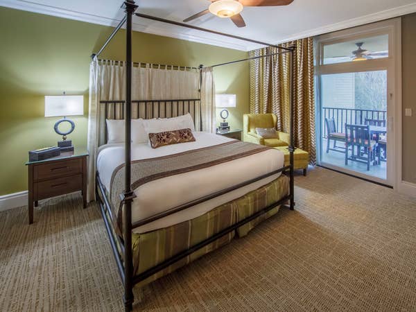 Bedroom with a balcony at Smoky Mountain Resort in Gatlinburg, Tennessee.