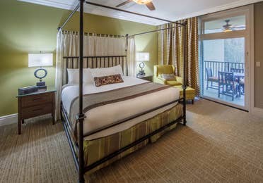 Bedroom with a balcony at Smoky Mountain Resort in Gatlinburg, Tennessee.
