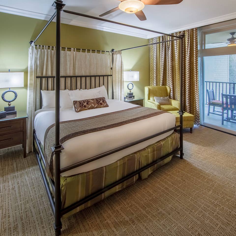 Bedroom with a balcony at Smoky Mountain Resort in Gatlinburg, Tennessee.