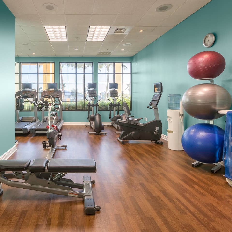 Fitness center with treadmills, yoga balls and weights at Sunset Cove Resort in Marco Island, FL.