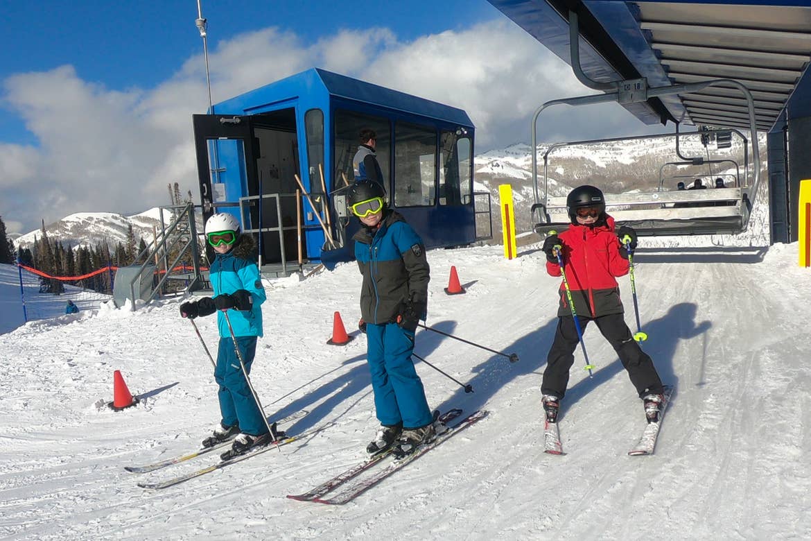Jessica's children come off the ski lift ready to make their way down the slopes.