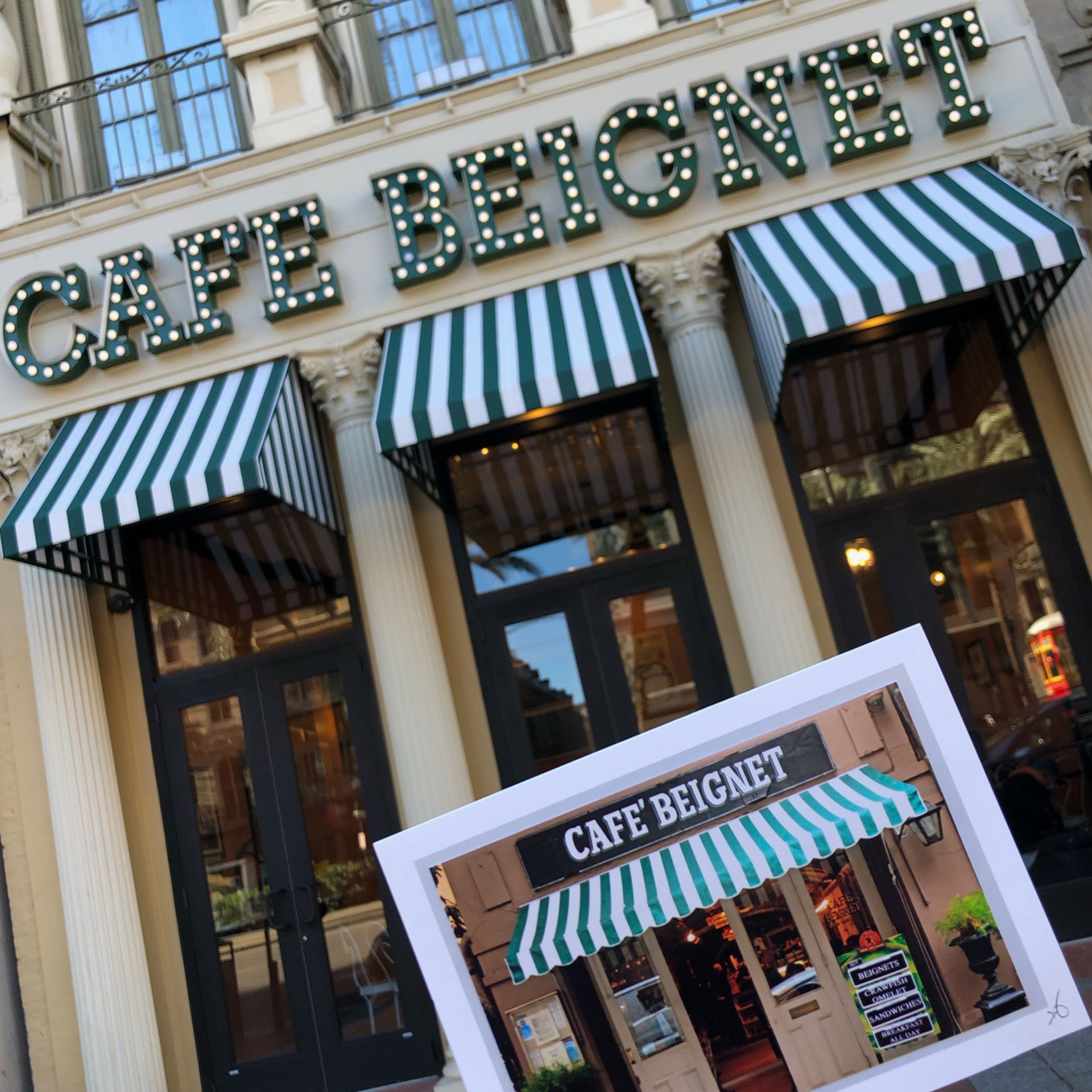 The current exterior of Cafe Beignet with a photograph showing the former exterior.
