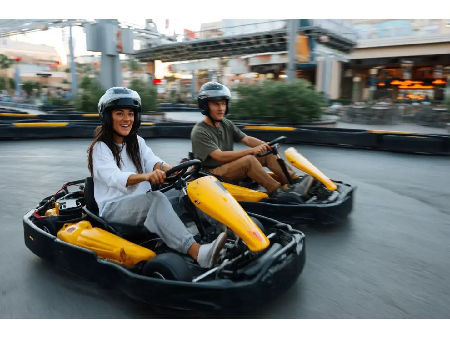 Teens racing go-karts at Octane Raceway Scottsdale Arizona.