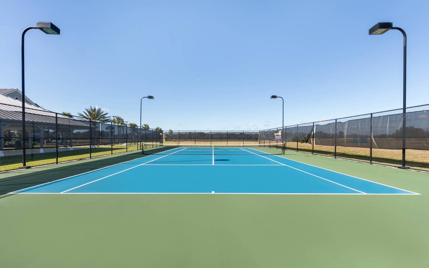 Outdoor tennis court at Orlando Breeze Resort near Orlando, Florida.