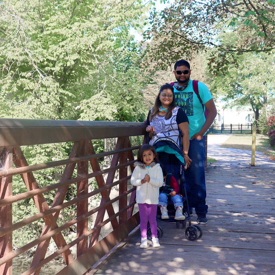 Featured Contributor, Karishma Kittur (top-left), her husband, Rohan (top-right) and two daughters, Myrra (front-left) and Amarra (front-right).