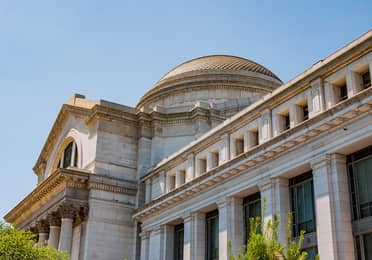 Exterior of the National Museum of Natural History with its domed roof in Washington, D.C.