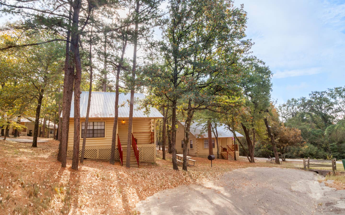 Property building surrounded by trees at Holly Lake Resort in Texas.