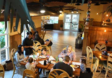 Family eating at River Island Grilling Company at Orange Lake Resort near Orlando, Florida.