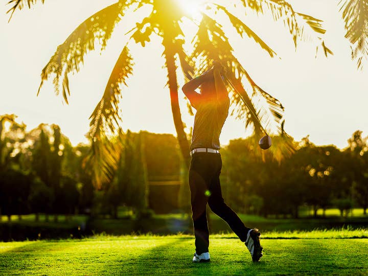 Man playing golf.