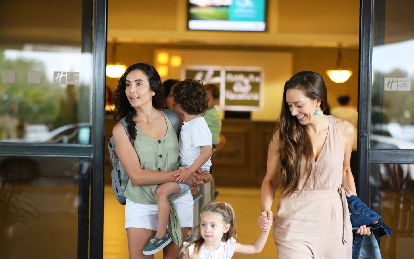 Two adults leaving check-in in West Village at Orange Lake Resort near Orlando, Florida.