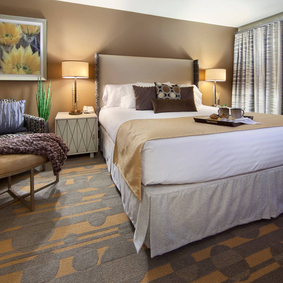 Bedroom in a one-bedroom villa at Desert Club Resort in Las Vegas