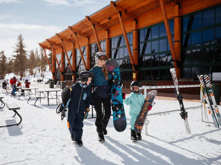 Family preparing to ski on Heavenly Mountain near Tahoe Ridge Resort in Stateline, Nevada.